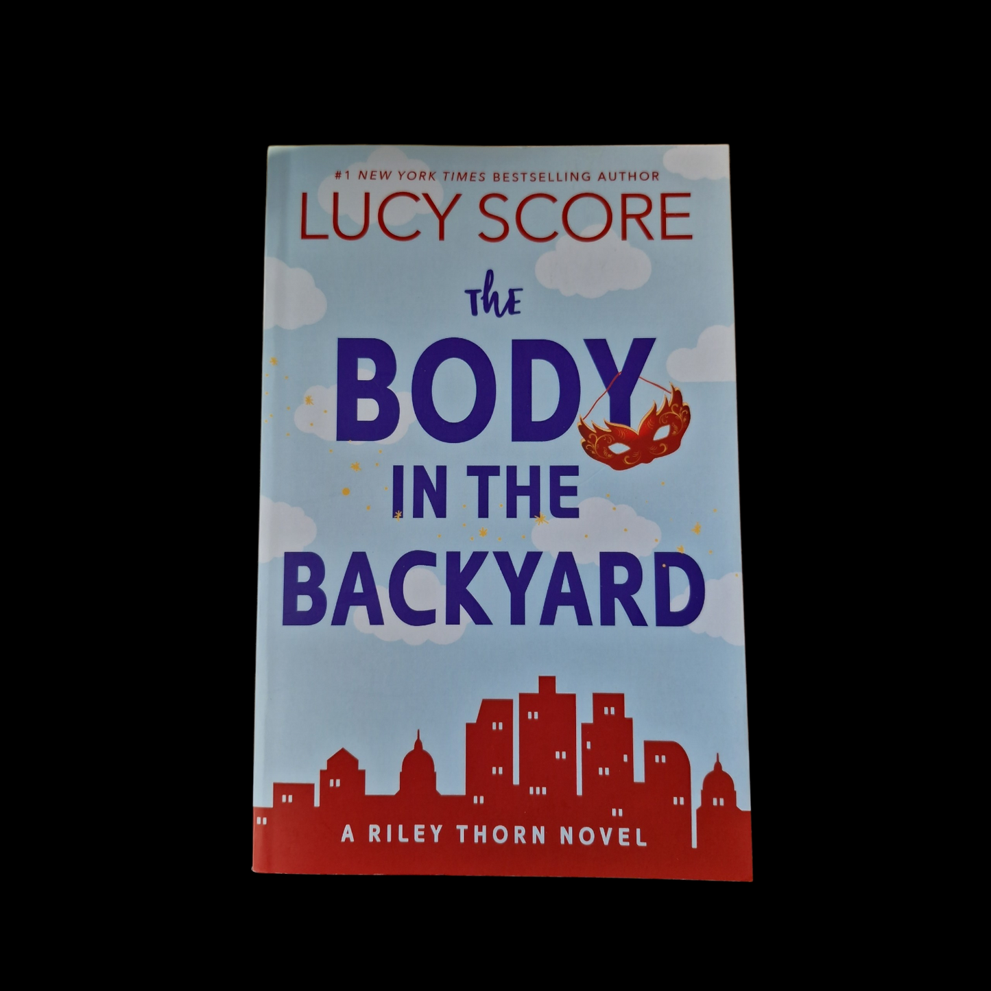 Lucy Score- The Body In The Backyard
