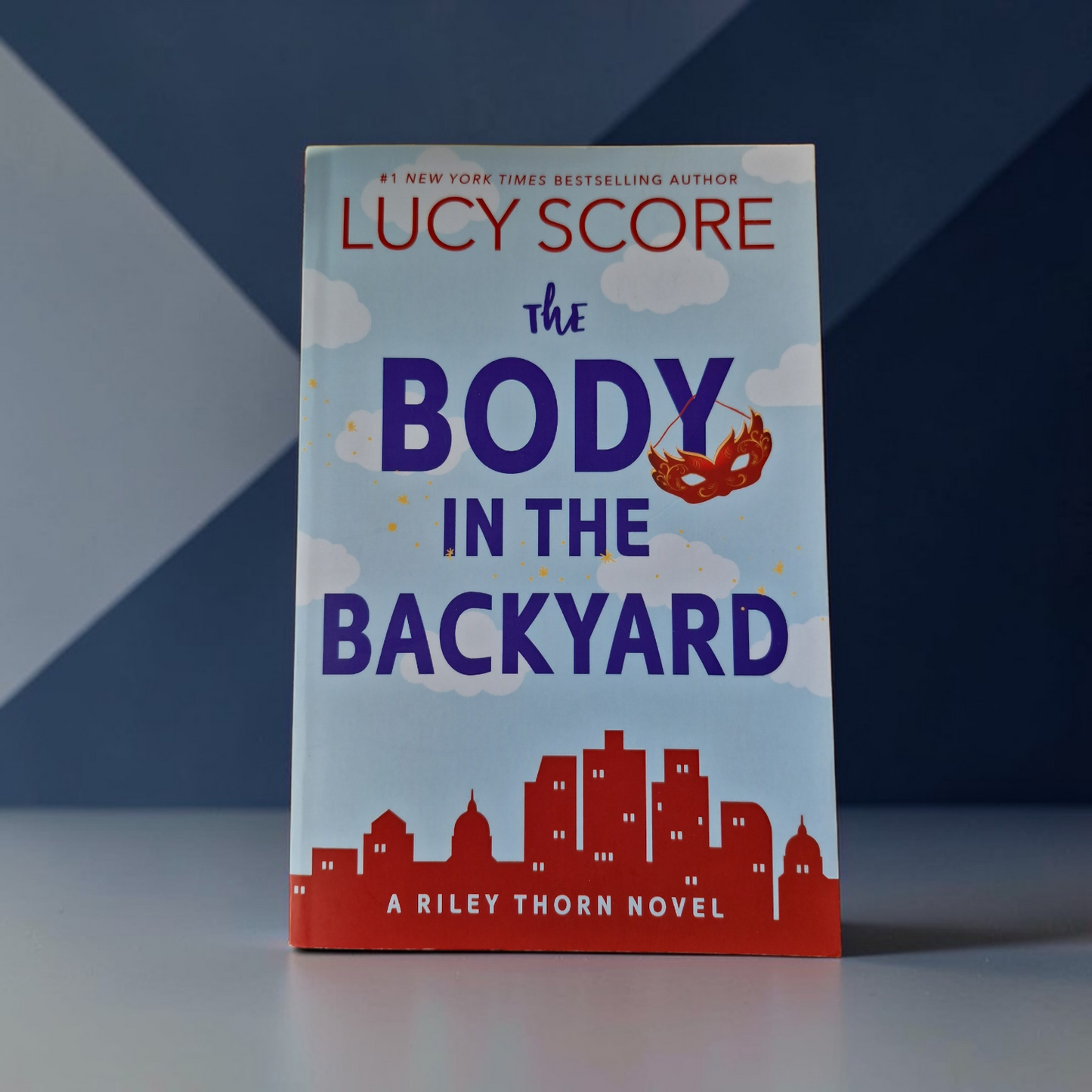 Lucy Score- The Body In The Backyard