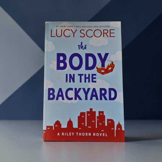 Lucy Score- The Body In The Backyard